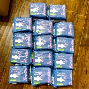 (14) Packs Carefree Breathe Super Pads 196 total!  NIB